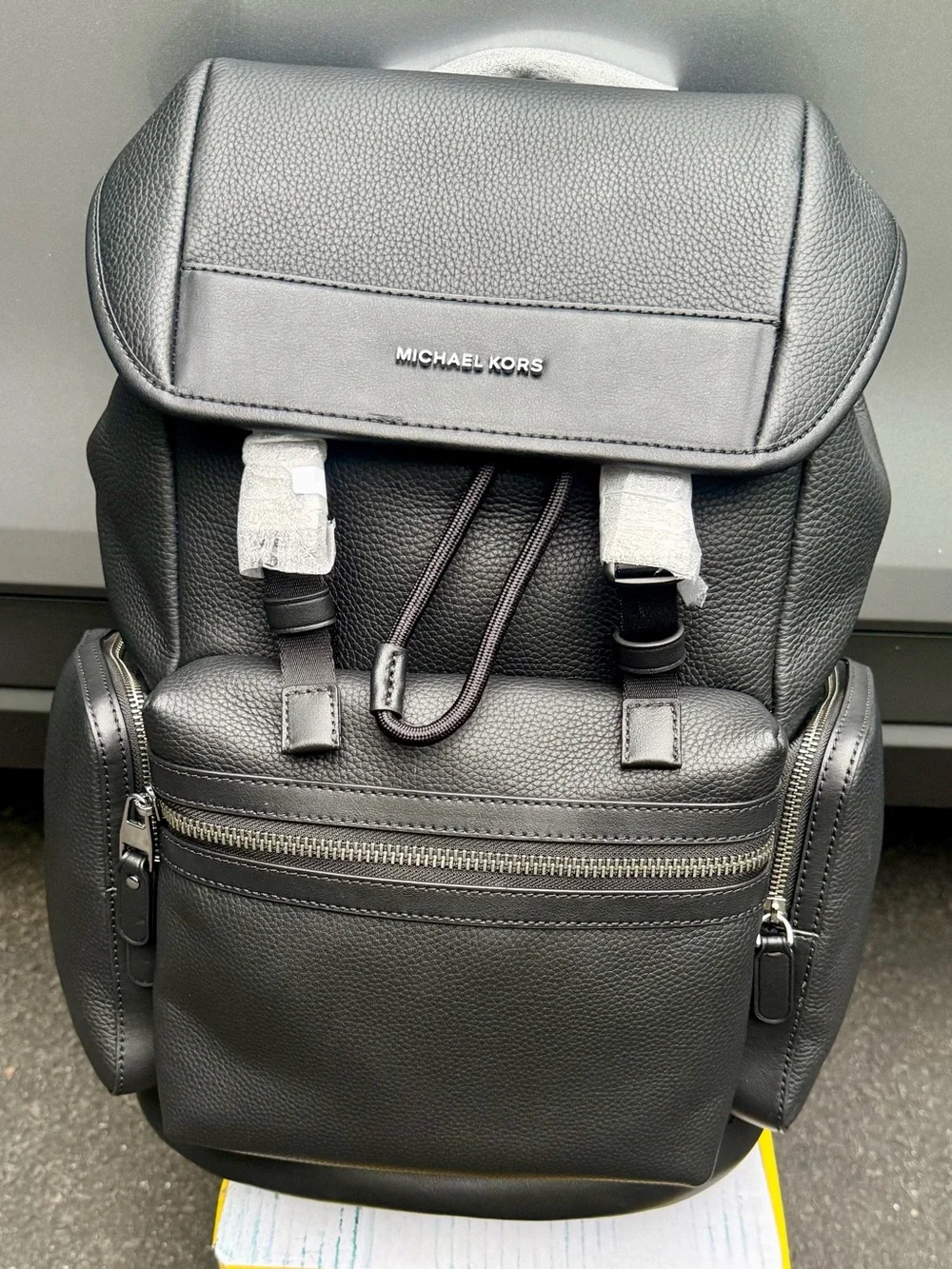 Michael Kors Black Pebbled Leather Men's Backpack with Buckle Straps